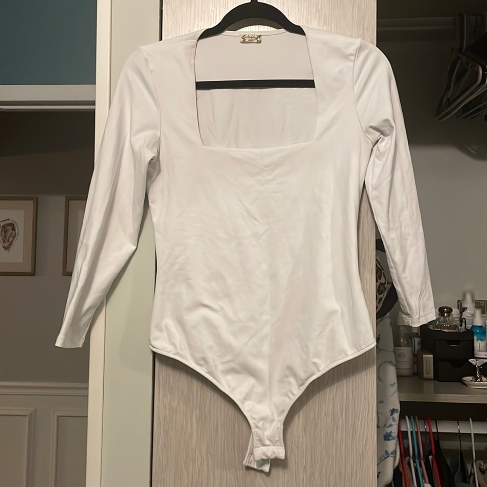 White square deck free people body suit